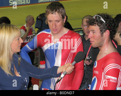 Jill Douglas of BBC television interviews Bradley Wiggins and Mark Cavendish winners of the Madison competition Stock Photo
