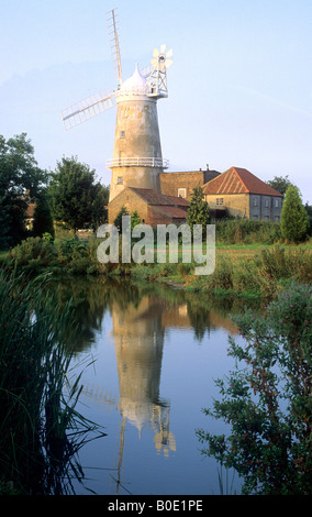 Denver Windmill Mill Norfolk tower mill white cap sails lake reflection East Anglia England UK Stock Photo