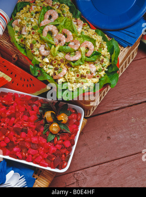 Country kitchen recipes, curried rice salad, Russian potato salad, picnic holiday celebration  atmosphere. Stock Photo