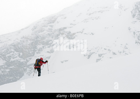 Backcountry skier skinning up the Seven Steps of Paradise, Asulkan Glacier, Selkirk Mountains, British Columbia, Canada