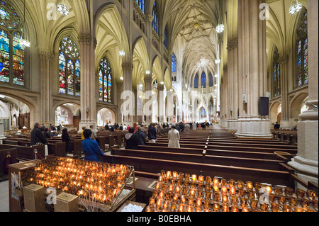 Celebration of Mass in St Patrick's Cathedral, 5th Avenue, Midtown Manhattan, New York City Stock Photo