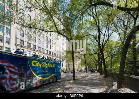 Tour Bus on Fifth Avenue outside Central Park, Manhattan, New York City Stock Photo