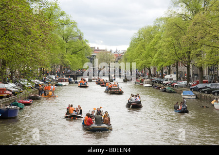 Parties on crowded boats. Queens day 30th April 2008 The annual Dutch national day Amsterdam Holland The Netherlands. Stock Photo