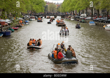 Parties on crowded boats. Queens day 30th April 2008 The annual Dutch national day Amsterdam Holland The Netherlands. Stock Photo