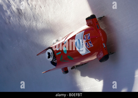 British two man Bobsleigh racing the Olympic run at St Moritz Switzerland Stock Photo