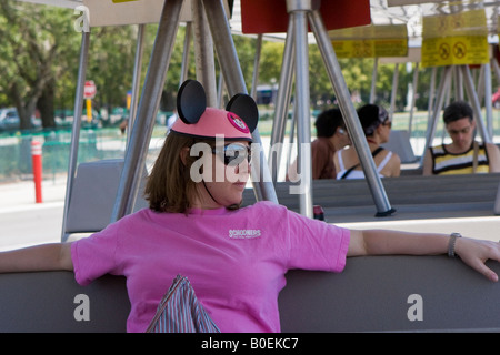 Female Tourist with Mickey Mouse Ears at Walt Disney World Resort in Orlando Florida Stock Photo