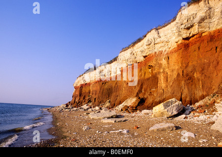 Hunstanton cliffs multi coloured layers carstone chalk Norfolk strata stratification geology geological sedimentary rock coast Stock Photo