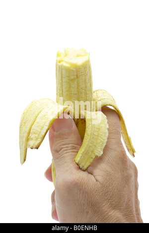Hand holding half eaten banana isolated on white Stock Photo