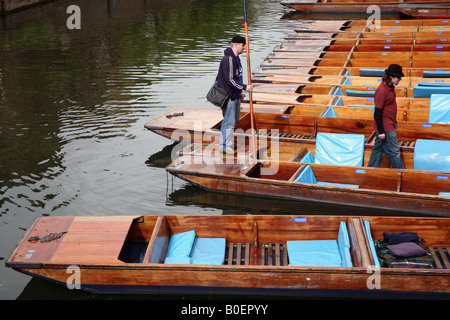 Punts for hire moored on River Cam in Cambridge