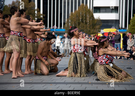 Maori people dance troupe perform in Christchurch town centre wearing traditional Maori dress, New Zealand,2008 Stock Photo