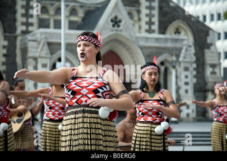 Maori dancers in Christchurch performing traditional Maori dance routines in public square, pictured female woman dancers, New Zealand Stock Photo