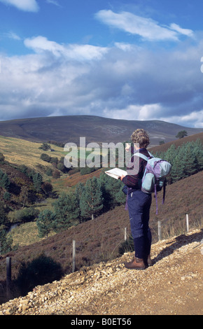 A walker on the Glenlivet estate near Tomintoul, Moray, Scotland, UK. Stock Photo