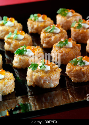 Seared salmon tartare canapes fine dining editorial food Stock Photo