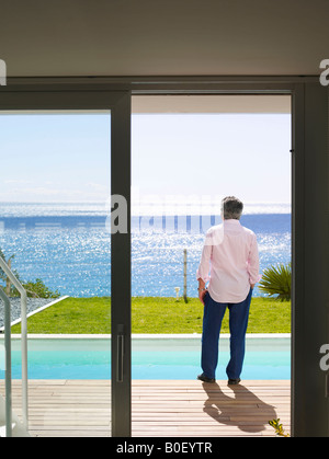 Mature man standing outdoors Stock Photo