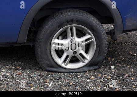 Deflated Wheel Tag car vehicle transport problem puncture breakdown flat tyre tire wheel ...