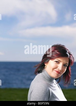 Portrait of woman outdoors Stock Photo