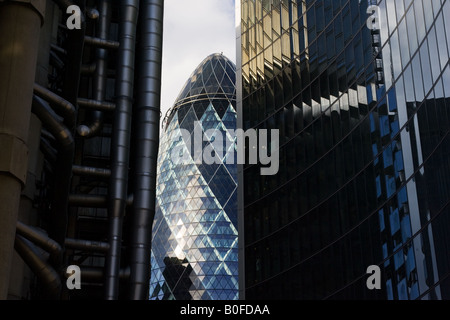 London landmarks Swiss Re Building between The Lloyds Building and The Willis Building England UK Stock Photo