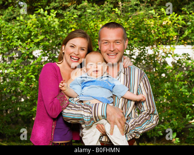 Portrait of mother, father and baby Stock Photo