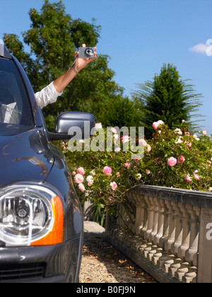 Woman's hand taking a picture Stock Photo