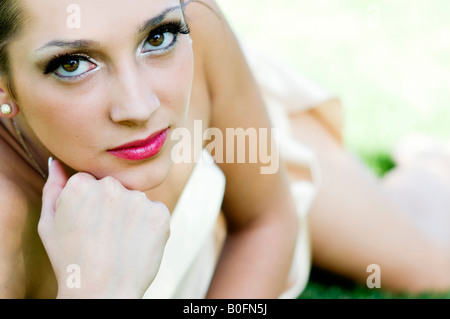 Beautiful young  girl in formal dress gown for high school prom night Stock Photo