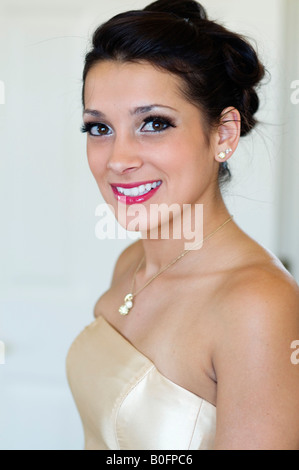 Beautiful young  girl in formal dress gown for high school prom night Stock Photo