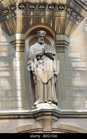 A statue at the entrance to Tree Court, Gonville and Caius College, Cambridge University, England Stock Photo