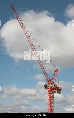Red Crame against Blue Sky with White Clouds Stock Photo