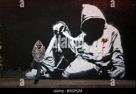 Graffiti of a hoodie by Banksy at the Cans Festival in Waterloo London England UK