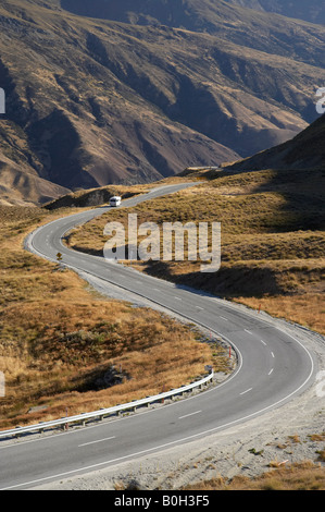 Campervan and Crown Range Road between Queenstown and Wanaka South Island New Zealand Stock Photo