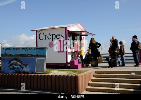 Tourists and locals queuing up at a crepes stand in Hoernum on the North Frisian island of Sylt, Schleswig-Holstein, Germany Stock Photo