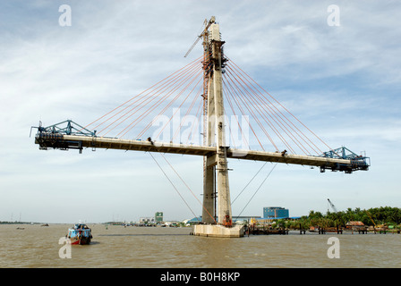 New construction of a suspension bridge across the Mekong River, Vietnam, Southeast Asia Stock Photo