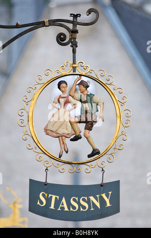 Medieval iron guild or craft sign in the Getreidegasse, Salzburg, Austria, Europe Stock Photo