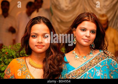 Two young women, guests at a Sufi wedding held at a Sufi shrine in Bareilly, Uttar Pradesh, India, Asia Stock Photo