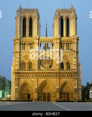 Notre Dame de Paris at dusk, west facade, gothic cathedral, Paris, France Stock Photo