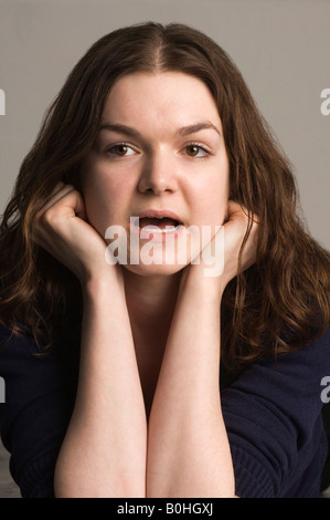 Portrait of young woman talking Stock Photo