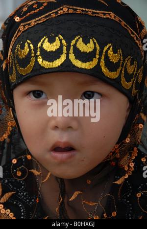 young muslim girl  mosque koh samui thailand Stock Photo