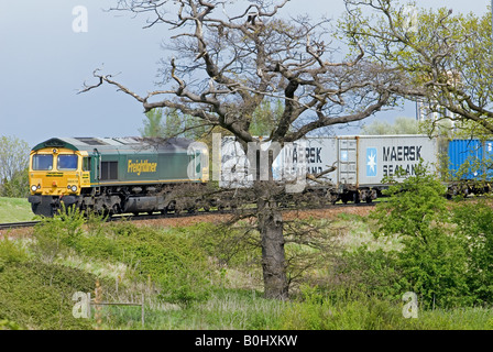 Freight train arriving at the Port of Felixstowe in Suffolk, Britain's largest container port but with only a single track line. Stock Photo