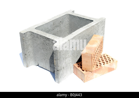 Concrete shuttering block and two perforated bricks isolated on white background Stock Photo
