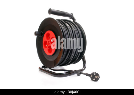 Extension cord reel on white floor indoors, space for text
