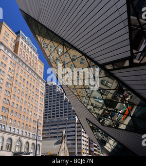 Reflections of Toronto buildings in the modern glass Crystal addition to the Royal Ontario Museum Stock Photo