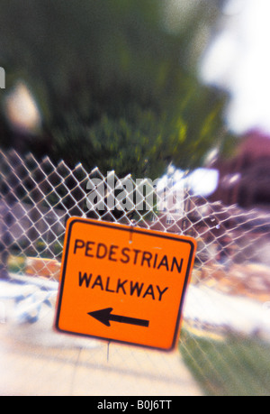 construction site pedestrian walkway directional sign Stock Photo