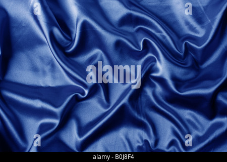 Luscious blue satin curvy and soft looking fantastic for backgrounds Stock Photo