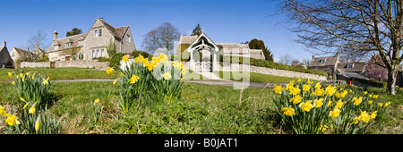 A panoramic view in springtime of the Cotswold village of Duntisbourne Abbots, Gloucestershire UK Stock Photo