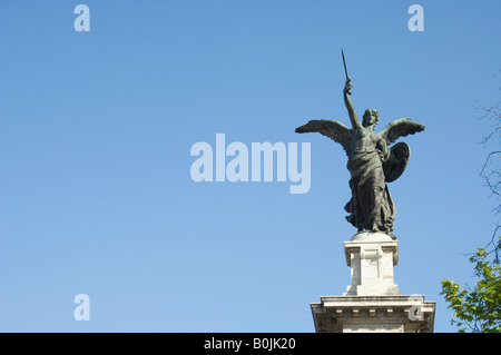 Statue of victory on column at entrance to bridge Ponte Vittorio Emanuele II in Rome Stock Photo
