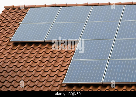 Solar panels producing electricity on the roof of a house in Horst, North Rhine Westphalia, Germany.
