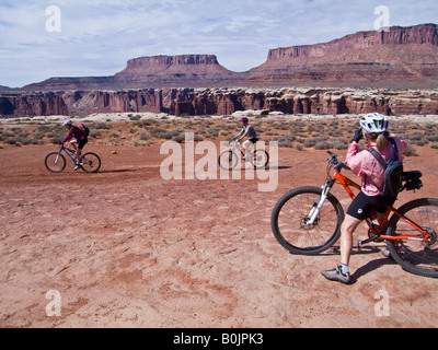 Mountain biker/s ride the White Rim Trail, Canyonlands National Park, Utah Stock Photo