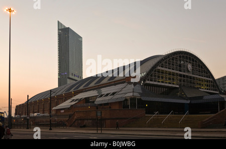 Manchester Central (G-MEX Centre) and Beetham Tower at night. Manchester, Greater Manchester, United Kingdom. Stock Photo