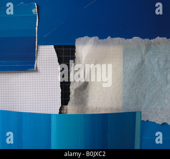 collage background of paper and fabric in blue, black and neutral colors Stock Photo