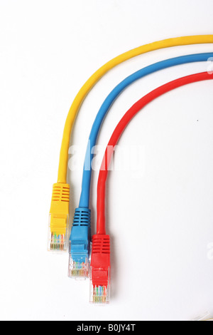 Category 5 network cables isolated on white three different colors red blue and yellow Stock Photo