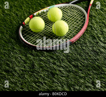 Tennis Balls on Racket Stock Photo